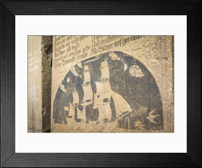 Framed Print : Old gravestone at the Church of St. Severin in Keitum, Sylt, Schleswig-Holstein, Germany