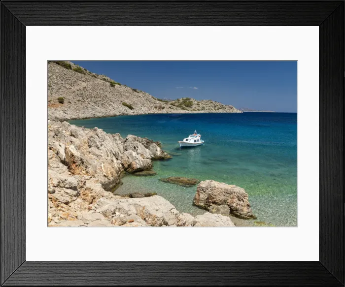 Framed Print : Fishing Boat in Marathounda Bay, Symi Island, Dodecanese Islands, Greece Framed Print : Fishing Boat in Marathounda Bay, Symi Island, Dodecanese Islands, Greece