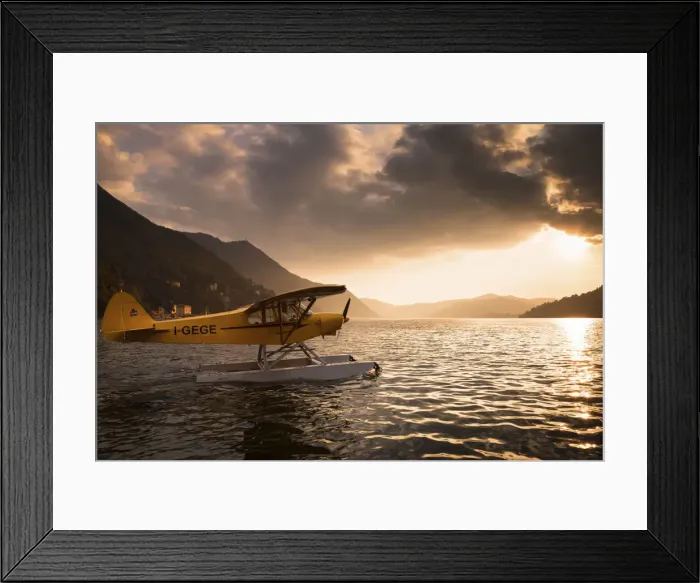 Framed Print : A seaplane on Como Lake at sunset. Lombardia. Italy Framed Print : A seaplane on Como Lake at sunset. Lombardia. Italy