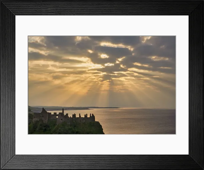 Framed Print : Sunrays over Dunluce Castle at Sunset, County Antrim, Northern Ireland Framed Print : Sunrays over Dunluce Castle at Sunset, County Antrim, Northern Ireland