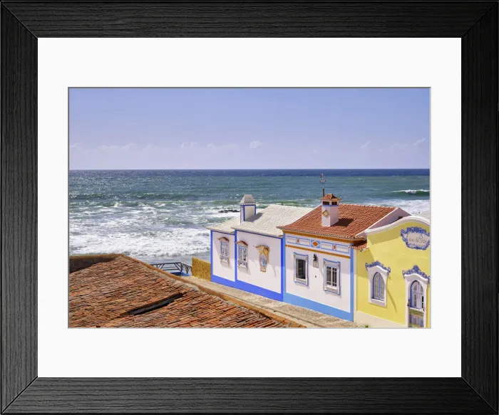 Framed Print : Traditional houses facing the Atlantic Ocean. Ericeira, Portugal Framed Print : Traditional houses facing the Atlantic Ocean. Ericeira, Portugal