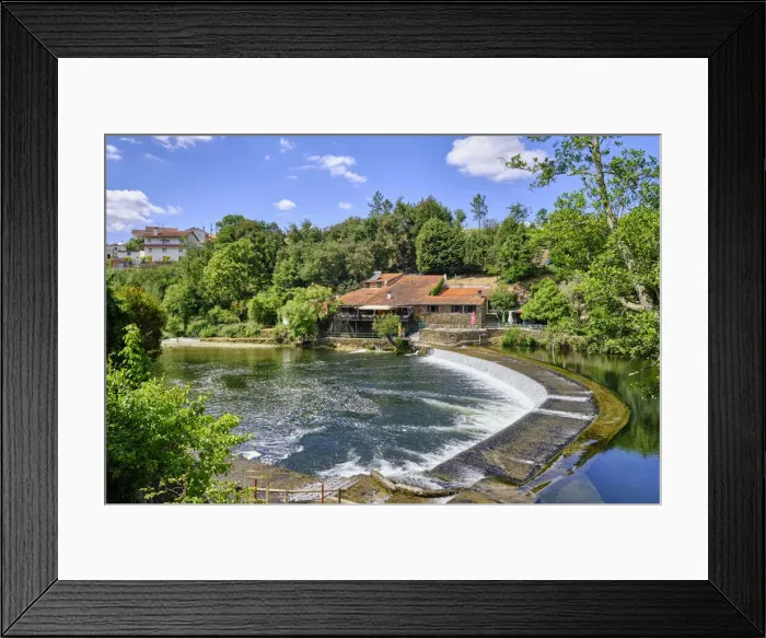 Framed Print : The Alva river at Coja with a restaurant on a old building on the riverside Framed Print : The Alva river at Coja with a restaurant on a old building on the riverside