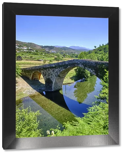 Medieval bridge crossing the Alva river in Alvoco das Varzeas. Serra do Acor, Portugal