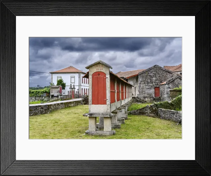 Framed Print : The longest granary (espigueiro) in Portugal with 29, 40m, dating back to 1853 Framed Print : The longest granary (espigueiro) in Portugal with 29, 40m, dating back to 1853