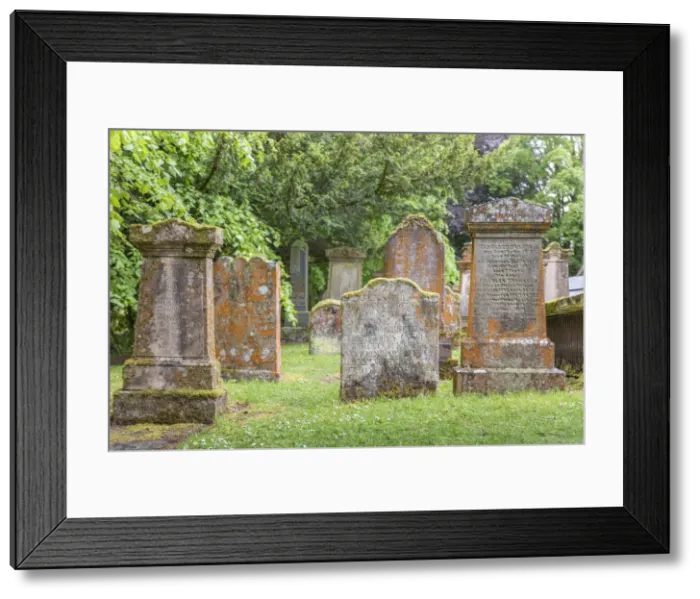 Framed Print : Old gravestones in the cemetery in the village of Luss, Loch Lomand, Aryll and Bute Framed Print : Old gravestones in the cemetery in the village of Luss, Loch Lomand, Aryll and Bute