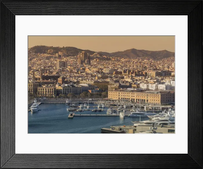 Framed Print : Port Vell marina and city skyline behind at sunset, Barcelona, Catalonia, Spain Framed Print : Port Vell marina and city skyline behind at sunset, Barcelona, Catalonia, Spain