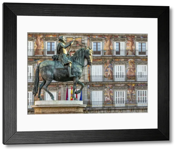 Framed Print : Equestrian statue of Philip III King of Spain with Casa de la Panaderia building behind Framed Print : Equestrian statue of Philip III King of Spain with Casa de la Panaderia building behind