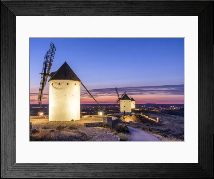 Framed Print : Scenic sunset view over the old Spanish windmills in Alcazar de San Juan