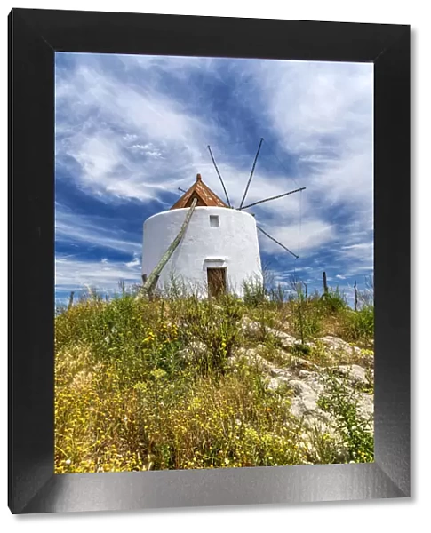 Windmill in a rural landscape of Andalusia, Spain
