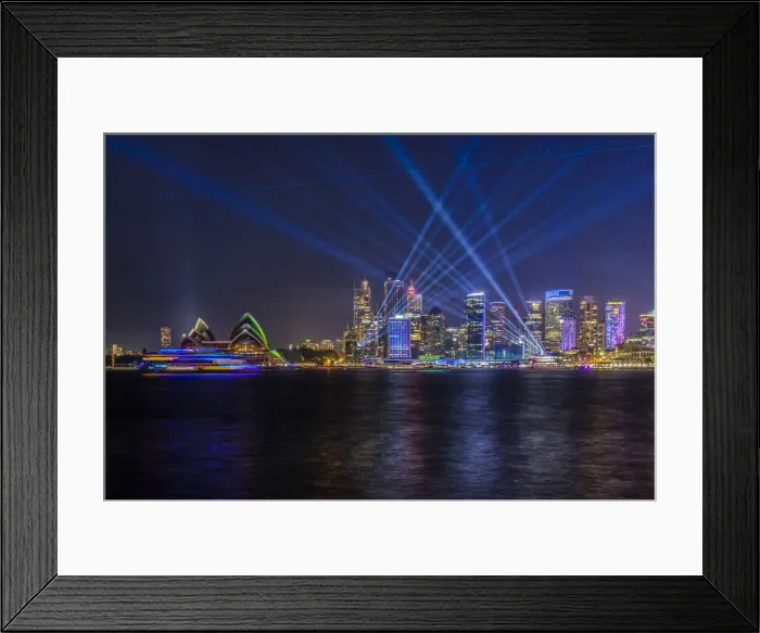 Framed Print : Sydney Opera House and skyline illumiated with projections Framed Print : Sydney Opera House and skyline illumiated with projections