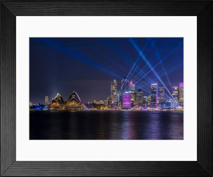 Framed Print : Sydney Opera House and skyline illumiated with projections Framed Print : Sydney Opera House and skyline illumiated with projections