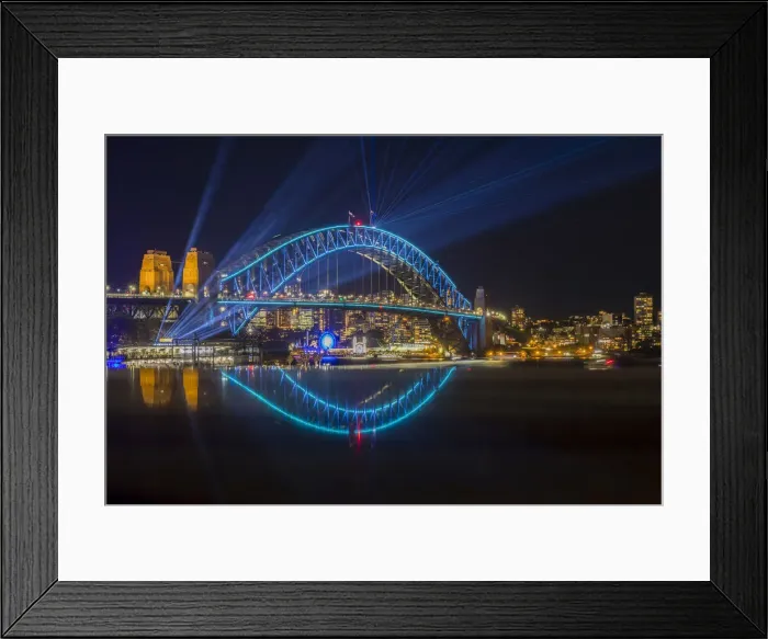 Framed Print : Sydney Harbour Bridge illumiated with coloured lights and lasers during Sydney Solstice Framed Print : Sydney Harbour Bridge illumiated with coloured lights and lasers during Sydney Solstice