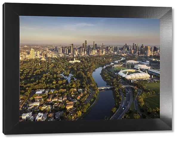 Aerial of the city, Yarra River, Royal Botanic Gardens and aMI Park stadium, Melbourne