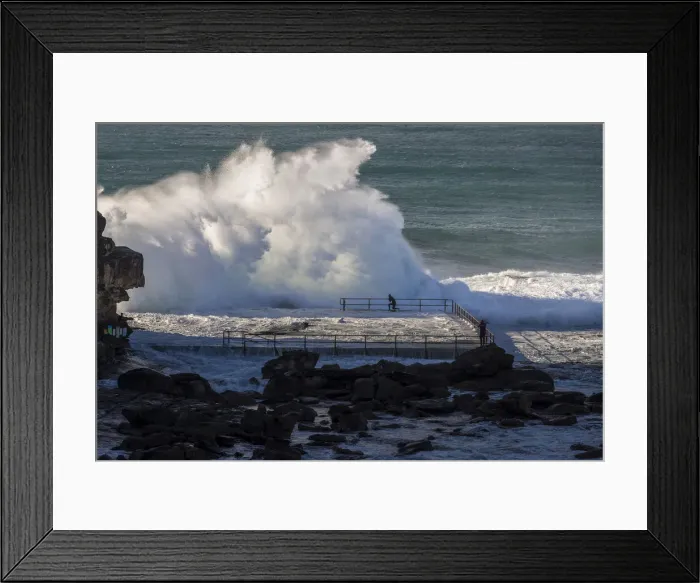 Framed Print : Swimmer braces as waves crash over rocks at North Curl Curl rockpool, New South Wales Framed Print : Swimmer braces as waves crash over rocks at North Curl Curl rockpool, New South Wales