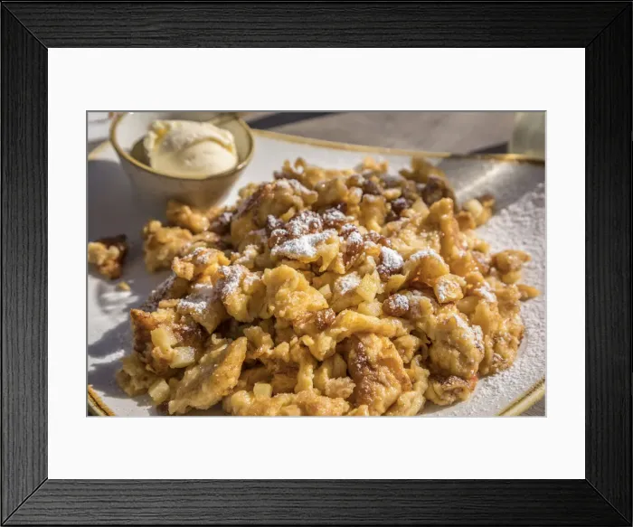 Framed Print : Cut-up and sugared pancake with raisins with vanilla ice cream in the Lucknerhaus Framed Print : Cut-up and sugared pancake with raisins with vanilla ice cream in the Lucknerhaus