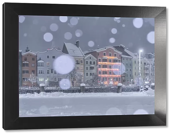 A snowy night by the Mariahilf buildings, Marktplatz, Innsbruck, Tyrol, Austria