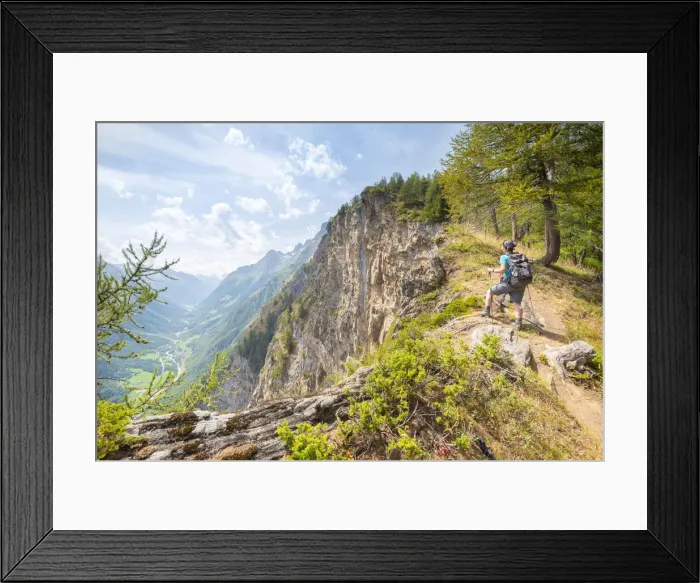 Framed Print : Hiker on a cliff, Plan Cou, Val di Rhemes, Gran Paradiso National Park, Vallee d Aoste Framed Print : Hiker on a cliff, Plan Cou, Val di Rhemes, Gran Paradiso National Park, Vallee d Aoste