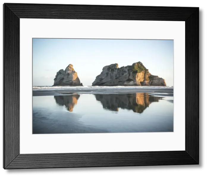 Framed Print : Reflection in Wharariki Beach, South Island, New Zealand, Oceania Framed Print : Reflection in Wharariki Beach, South Island, New Zealand, Oceania