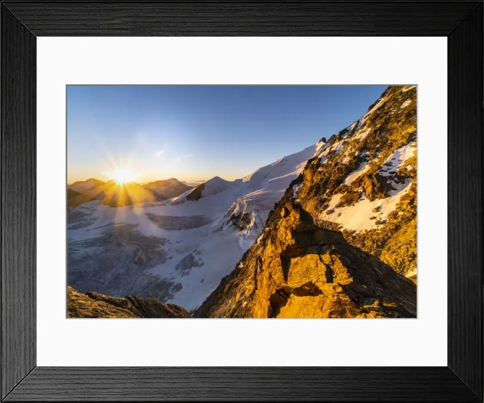 Framed Print : The rocks of Dirrunhorn and glacier of Nadelhorn peak at sunrise from Nadelgrat ridge