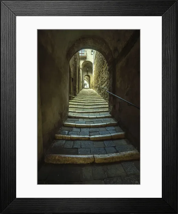 Framed Print : Stone steps in a narrow alley between medieval houses, access to the Jewish ghetto of Framed Print : Stone steps in a narrow alley between medieval houses, access to the Jewish ghetto of