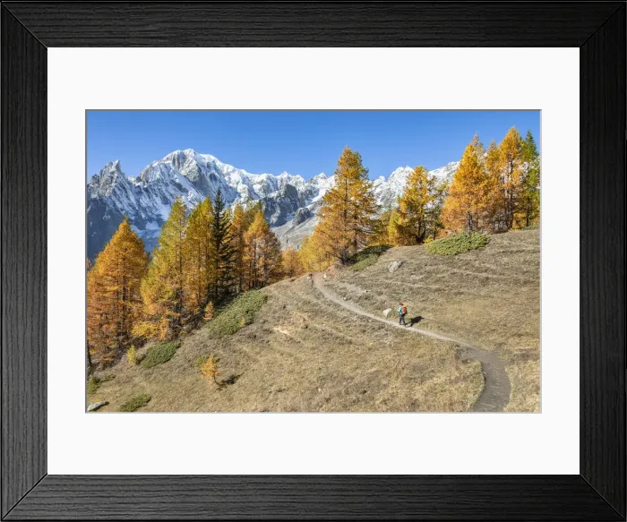 Framed Print : Mont Blanc Massif: a trekker is walking to the Bonatti Refuge during the Mont Blanc Framed Print : Mont Blanc Massif: a trekker is walking to the Bonatti Refuge during the Mont Blanc