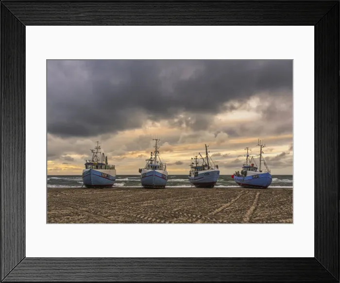 Framed Print : Fishing boats pulled ashore awaiting the storm in the small fishing village of Framed Print : Fishing boats pulled ashore awaiting the storm in the small fishing village of