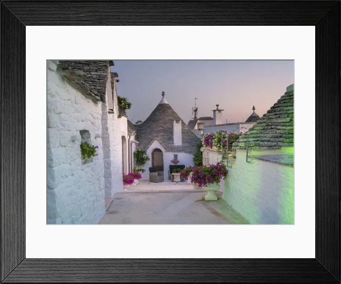 Framed Print : Alberobello, province of Bari, Apulia, Italy The typical Trulli huts at dawn Framed Print : Alberobello, province of Bari, Apulia, Italy The typical Trulli huts at dawn
