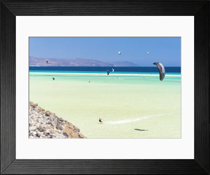 Framed Print : People riding the ocean waves with kiteboard at Sotavento beach, Jandia, Fuerteventura Framed Print : People riding the ocean waves with kiteboard at Sotavento beach, Jandia, Fuerteventura