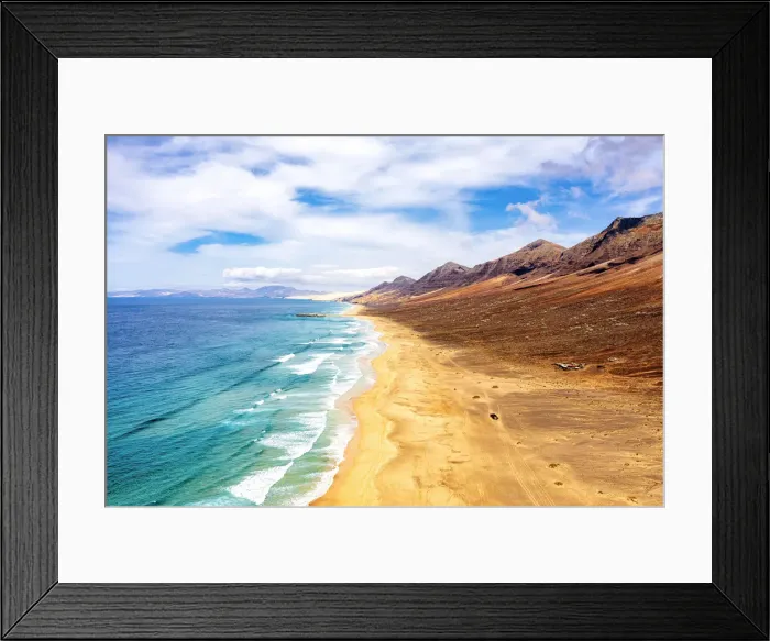 Framed Print : jeep traveling on empty Cofete Beach washed by ocean waves, Jandia, Fuerteventura Framed Print : jeep traveling on empty Cofete Beach washed by ocean waves, Jandia, Fuerteventura