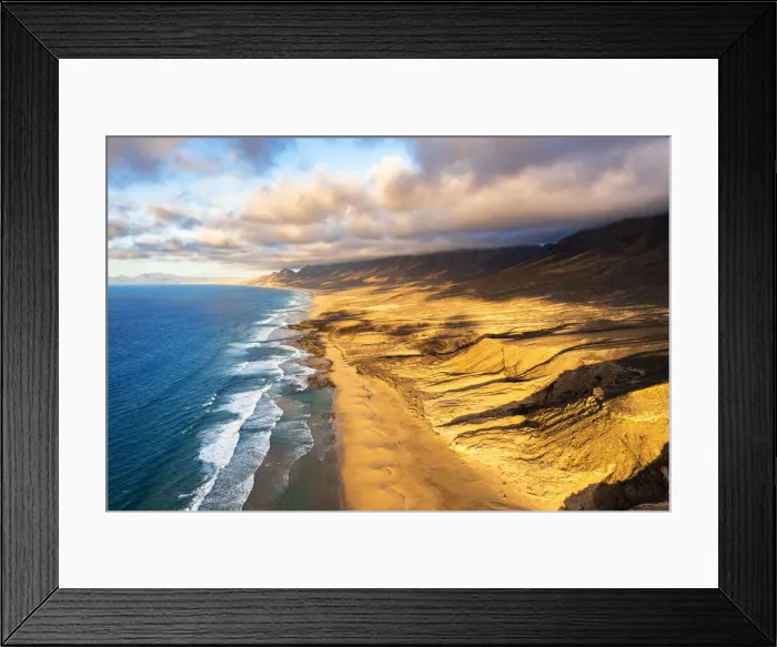 Framed Print : Sunset over mountains and golden sand of Cofete Beach washed by the ocean, Jandia Framed Print : Sunset over mountains and golden sand of Cofete Beach washed by the ocean, Jandia