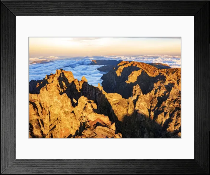 Framed Print : Majestic mountains of Pico das Torres and Pico do Arieiro lit by sunset, aerial view Framed Print : Majestic mountains of Pico das Torres and Pico do Arieiro lit by sunset, aerial view