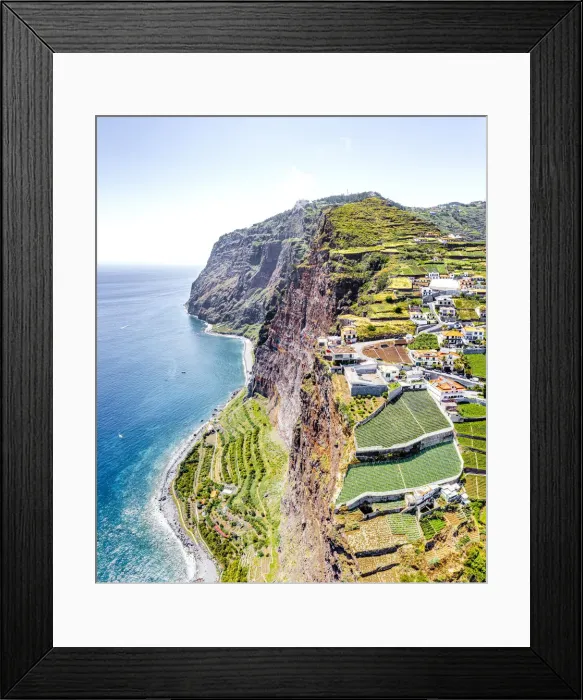 Framed Print : Camara de Lobos town and Rancho cableway on rocky mountain above the ocean Framed Print : Camara de Lobos town and Rancho cableway on rocky mountain above the ocean