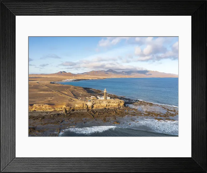 Framed Print : Punta Jandia lighthouse (Faro de la Lola) on cliffs above the ocean, Fuerteventura Framed Print : Punta Jandia lighthouse (Faro de la Lola) on cliffs above the ocean, Fuerteventura