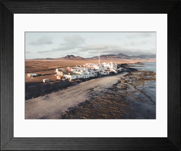 Framed Print : Coastal village of El Puertito and wind turbine, close to Punta de Jandia, Fuerteventura Framed Print : Coastal village of El Puertito and wind turbine, close to Punta de Jandia, Fuerteventura