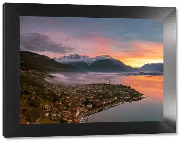 Panoramic of Lake Como and the lakeshore town of Domaso at sunrise, aerial view