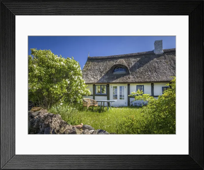 Framed Print : Idyllic half-timbered house in Listed on Bornholm, Denmark Framed Print : Idyllic half-timbered house in Listed on Bornholm, Denmark