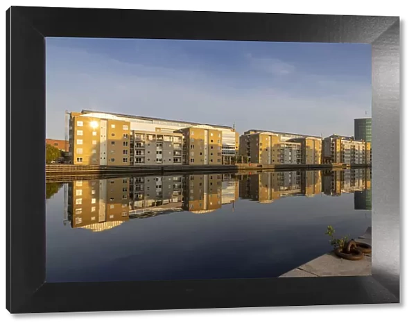 Apartments in Langelinie reflected in the Baltic sea, Copenhagen, Zealand, Denmark