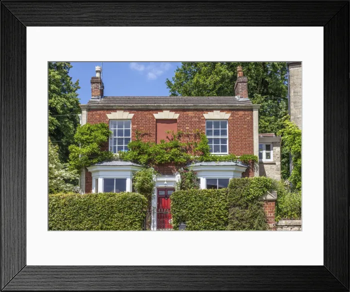 Framed Print : Historic house in Uley, Cotswolds, Gloucestershire, England Framed Print : Historic house in Uley, Cotswolds, Gloucestershire, England
