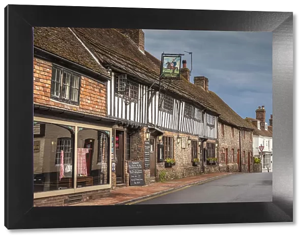 Village street in Alfriston, East Sussex, England