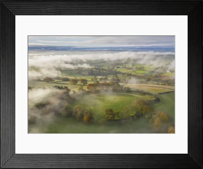 Framed Print : Misty autumn morning above Cadbury Castle Iron Age Hillfort, Cadbury, Devon, England Framed Print : Misty autumn morning above Cadbury Castle Iron Age Hillfort, Cadbury, Devon, England