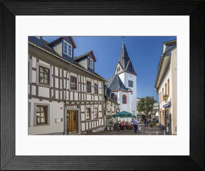 Framed Print : Old town alley in Idstein with Union Church, Hesse, Germany Framed Print : Old town alley in Idstein with Union Church, Hesse, Germany