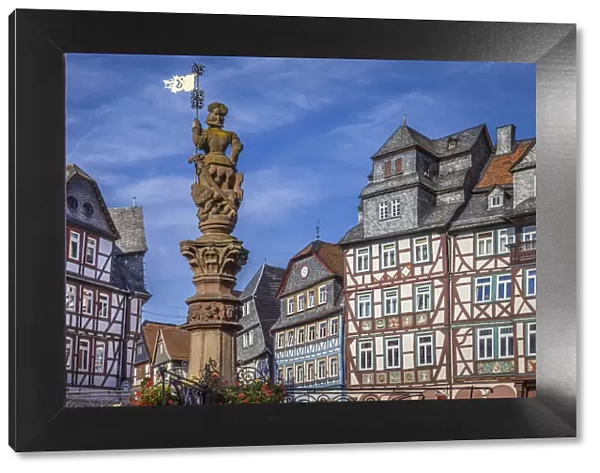 Half-timbered houses and fountains at Katharinenmarkt in Butzbach, Wetterau, Hesse