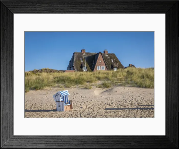 Framed Print : Beach chair and thatched roof house on the east beach of List, Sylt, Schleswig-Holstein Framed Print : Beach chair and thatched roof house on the east beach of List, Sylt, Schleswig-Holstein