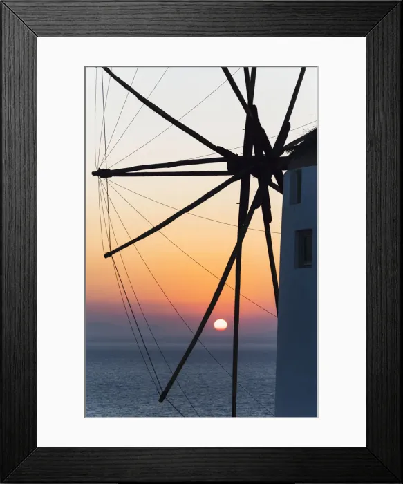Framed Print : Oia village, Santorini, Cyclades Islands, Greece. Sunset through the windmill landmark Framed Print : Oia village, Santorini, Cyclades Islands, Greece. Sunset through the windmill landmark