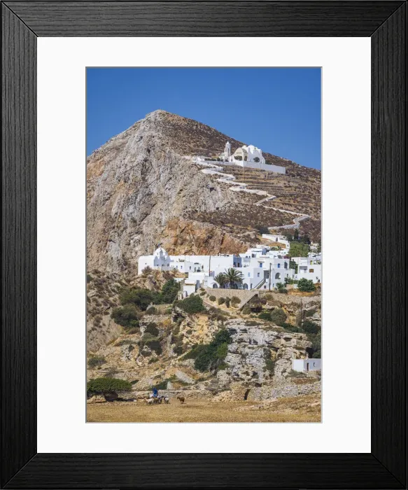 Framed Print : shepherd with goats and the Hora Village in Folegandros, Cyclades Islands, Greece Framed Print : shepherd with goats and the Hora Village in Folegandros, Cyclades Islands, Greece