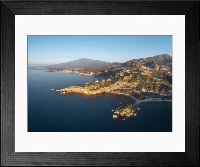 Framed Print : Taormina, Sicily, Italy. Coastal aerial landscape and Mount Etna in the backdrop Framed Print : Taormina, Sicily, Italy. Coastal aerial landscape and Mount Etna in the backdrop
