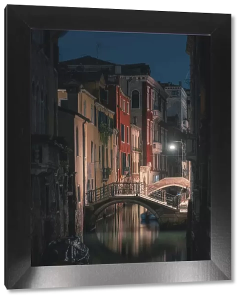 Venice, Veneto, Italy. Backstreet canals in Castello at night