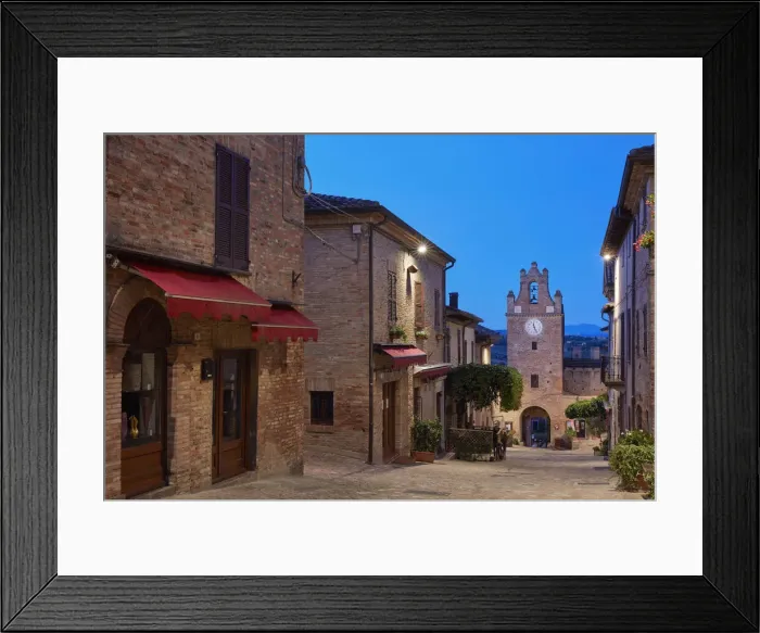 Framed Print : The clock tower of the medieval village of Gradara before sunrise with the hills in Framed Print : The clock tower of the medieval village of Gradara before sunrise with the hills in