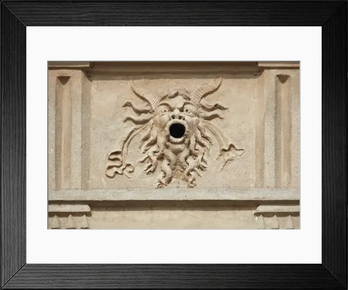 Framed Print : A Mascaron ornament over the exterior facade of the Palazzo Te courtyard, Mantua Framed Print : A Mascaron ornament over the exterior facade of the Palazzo Te courtyard, Mantua