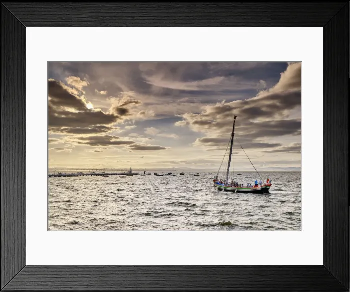 Framed Print : Traditional boat (Bote Leao) in the Tagus river. Lisbon is in front
